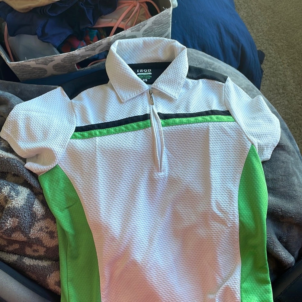 Black, white and green golf shirt